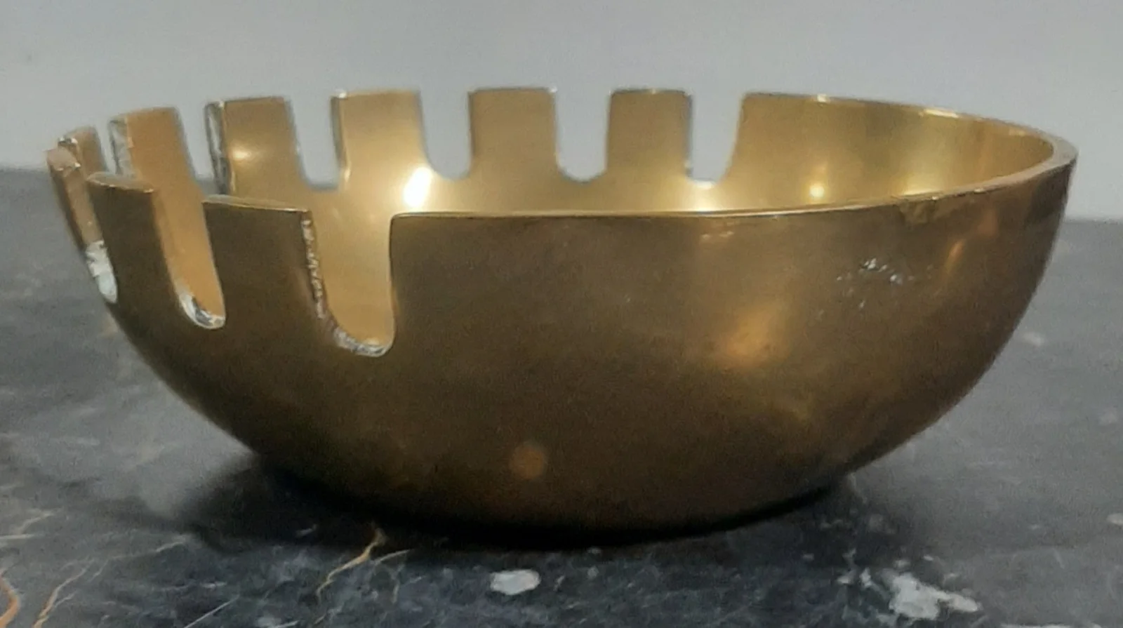Cenicero de bronce