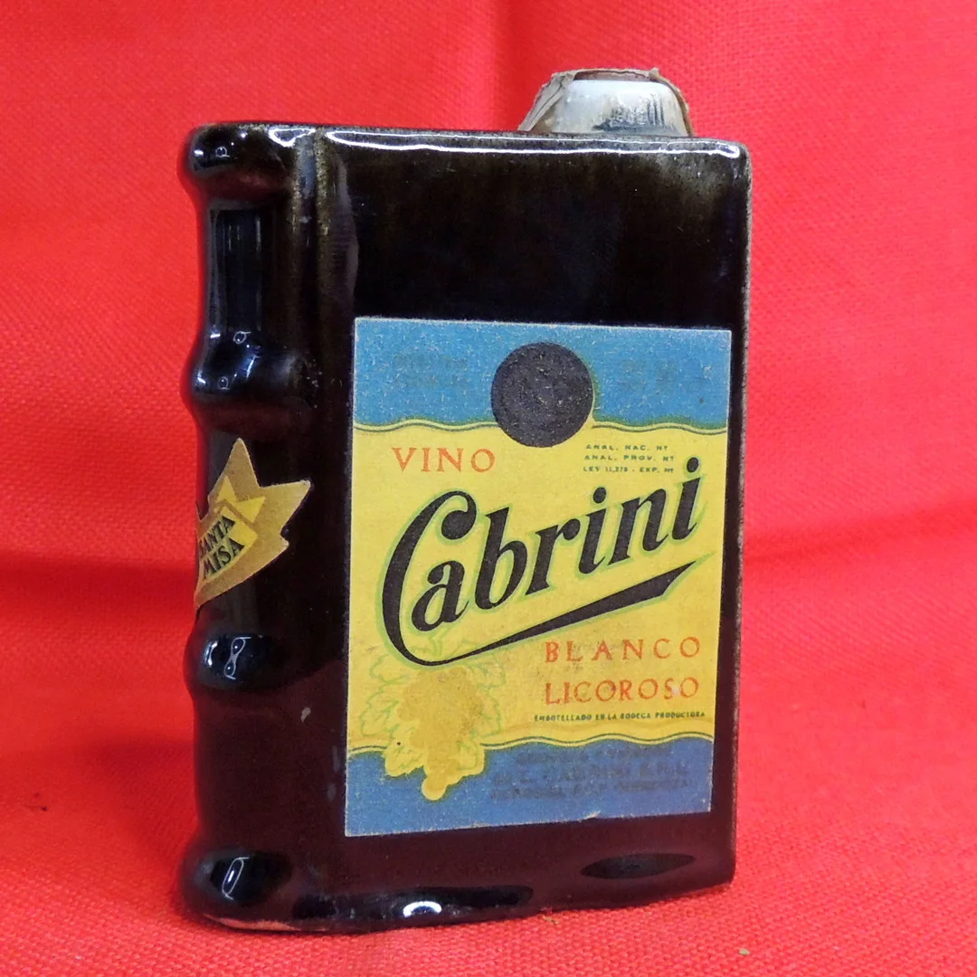 Botella miniatura con forma de libro